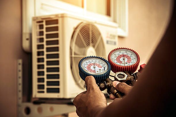 Professional Heat Pump Repair technician working in Clearwater, KS